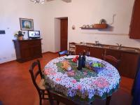 A television and/or entertainment centre at Belvilla by OYO Splendid Farmhouse with Jacuzzi