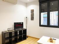 TV a/nebo společenská místnost v ubytování INSIDEHOME Apartments - Dúplex de Javier