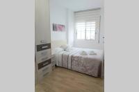 Posteľ alebo postele v izbe v ubytovaní BONITO APARTAMENTO