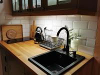 Kuchyňa alebo kuchynka v ubytovaní Apartament Zielone Okiennice