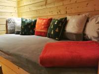 Posteľ alebo postele v izbe v ubytovaní Apartament Zielone Okiennice