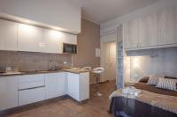 Kuchnia lub aneks kuchenny w obiekcie Prima dell'Elba Family Apartments