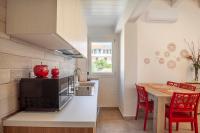 Kuchnia lub aneks kuchenny w obiekcie Prima dell'Elba Family Apartments