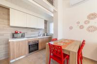 Kuchnia lub aneks kuchenny w obiekcie Prima dell'Elba Family Apartments