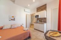 Kuchnia lub aneks kuchenny w obiekcie Prima dell'Elba Family Apartments