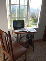 TV a/nebo společenská místnost v ubytování Casa MiraXurés con vistas a la Sierra del Xurés