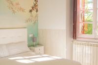 Postel nebo postele na pokoji v ubytování Casa Jardín El Colmenar