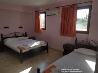 Postel nebo postele na pokoji v ubytování Hotels Kalimera Inn