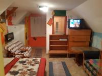 A television and/or entertainment centre at chata Ivka Leštiny