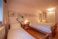Posteľ alebo postele v izbe v ubytovaní L'Atelier du Temps - PincherleStyle Apartment