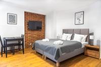 Postel nebo postele na pokoji v ubytování Apartamenty, Boutique Rooms Villa 82, MIEJSCE PRKINGOWE