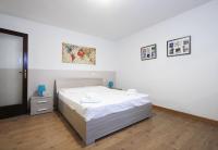 A bed or beds in a room at Yourbanflat San Giovanni