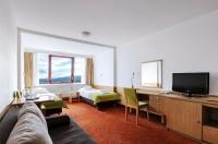 Televízia a/alebo spoločenská miestnosť v ubytovaní Interferie Sport Hotel Bornit
