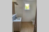 a bathroom with a sink and a toilet at Studio indépendant Lisieux in Lisieux