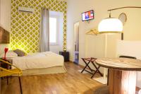 A bed or beds in a room at Albergo delle Spezie