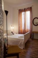 A bed or beds in a room at Albergo delle Spezie