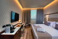Savhotel Aemilia Bolognaにあるベッド