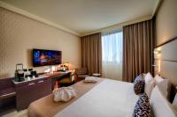 Savhotel Aemilia Bolognaにあるベッド