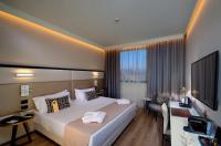 Savhotel Aemilia Bolognaにあるベッド