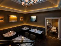 a restaurant with two tables in a room at Cassidys Hotel in Dublin