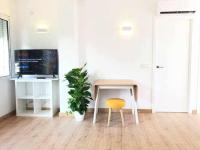 A television and/or entertainment centre at Apartamento 3º Playa Puerto de Pollensa