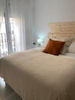 Posteľ alebo postele v izbe v ubytovaní Homely Málaga Larios