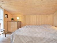 Postel nebo postele na pokoji v ubytování Three-Bedroom Holiday home in Otterup 4