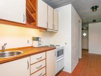 Kuchyň nebo kuchyňský kout v ubytování Apartment Brovst II