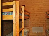 Palanda nebo palandy na pokoji v ubytování Four-Bedroom Holiday home in Bygstad 2