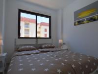 Postel nebo postele na pokoji v ubytování Belvilla by OYO Modern Apartment in Orihuela Costa