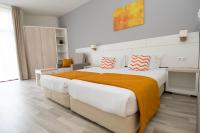 Postel nebo postele na pokoji v ubytování Park Hotel Odessos - All Inclusive