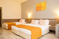 Postel nebo postele na pokoji v ubytování Park Hotel Odessos - All Inclusive