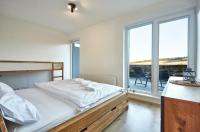 Postel nebo postele na pokoji v ubytování Mountain Apartments Klínovec Hexagon
