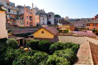 a view of a city with buildings and trees at Hotel Santa Maria in Rome