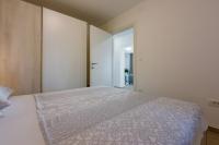 Posteľ alebo postele v izbe v ubytovaní Apartment in Crikvenica 34973