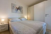 Posteľ alebo postele v izbe v ubytovaní Apartment in Crikvenica 34973