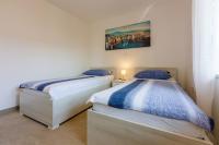 Posteľ alebo postele v izbe v ubytovaní Apartment in Crikvenica 34973