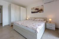 Posteľ alebo postele v izbe v ubytovaní Apartment in Crikvenica 34973