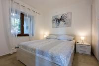 Posteľ alebo postele v izbe v ubytovaní Apartment in Crikvenica 34973