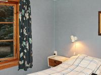 Postel nebo postele na pokoji v ubytování Three-Bedroom Holiday home in Vågland