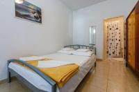 Postel nebo postele na pokoji v ubytování One-Bedroom Apartment in Dramalj XXV