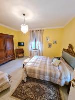 Posteľ alebo postele v izbe v ubytovaní B&B Al Calcandola