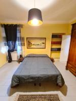 Posteľ alebo postele v izbe v ubytovaní B&B Al Calcandola