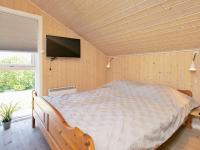 Postel nebo postele na pokoji v ubytování Three-Bedroom Holiday home in Otterup 4