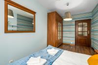 Posteľ alebo postele v izbe v ubytovaní Sleepway Apartments- Szyperska