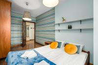Posteľ alebo postele v izbe v ubytovaní Sleepway Apartments- Szyperska