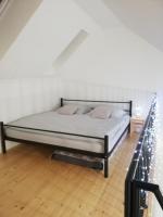 Postel nebo postele na pokoji v ubytování Apartman Honey