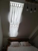 Postel nebo postele na pokoji v ubytování Apartman Honey