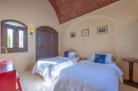 Postel nebo postele na pokoji v ubytování VESTA - El Gouna Residence