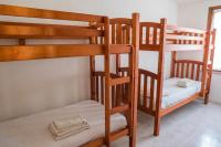 A bed or beds in a room at Casetta Delle Allodole